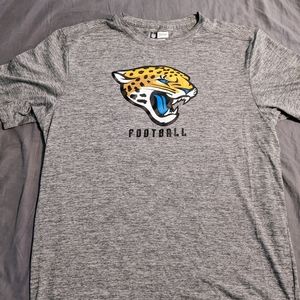 NFL Team Apparel - TX3 Cool - Jacksonville Jaguars Football Tee.